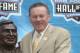 CANTON, OH - AUGUST 3: Pro Football Hall of Fame inductee Hank Stram (L) poses with his bust and his presenter and fellow Hall of Famer Len Dawson during the 2003 NFL Hall of Fame Induction ceremony on August 3, 2003 in Canton, Ohio. (Photo by David Maxwell/Getty Images)
