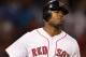 BOSTON, MA - AUGUST 30: Carl Crawford #13 of the Boston Red Sox rounds first base after his solo home run in the fourth inning against the New York Yankees on August 30, 2011 at Fenway Park in Boston, Massachusetts. (Photo by Elsa/Getty Images)