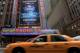 NEW YORK, NY - APRIL 28: Taxi cabs drive down the Avenue of the Americas past the Radio City Music Hall marquee, site of the 2011 NFL Draft, on April 28, 2011 in New York City. (Photo by Chris Trotman/Getty Images)