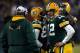 GREEN BAY, WI - JANUARY 15: Aaron Rodgers #12 of the Green Bay Packers reacts after a play against the New York Giants during their NFC Divisional playoff game at Lambeau Field on January 15, 2012 in Green Bay, Wisconsin. (Photo by Scott Boehm/Getty Images)