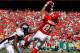 KANSAS CITY, MO - SEPTEMBER 28: Tony Gonzalez #88 of the Kansas City Chiefs catches a pass in front of Boss Bailey #97 of the Denver Broncos on September 28, 2008 at Arrowhead Stadium in Kansas City, Missouri. (Photo by Jamie Squire/Getty Images)
