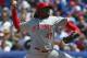 Reds starting pitcher Johnny Cueto had per-season averages of 10.3 wins and 133 strikeouts from 2008-11.