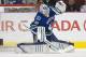 VANCOUVER, CANADA - MARCH 28: Goalie Cory Schneider #35 of the Vancouver Canucks makes a glove save against the Colorado Avalanche during the second period in NHL action on March 28, 2012 at Rogers Arena in Vancouver, British Columbia, Canada. (Photo by Rich Lam/Getty Images)