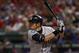 ARLINGTON, TX - APRIL 11: Ichiro Suzuki #51 of the Seattle Mariners hits against the Texas Rangers at Rangers Ballpark in Arlington on April 11, 2012 in Arlington, Texas. (Photo by Rick Yeatts/Getty Images)