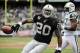 OAKLAND, CA - SEPTEMBER 25: Darren McFadden #20 of the Oakland Raiders tosses the ball away after scoring on a two yard touchdown run against the New York Jets in the first quarter during an NFL football game at the O.co Coliseum September 25, 2011 in Oakland, California. (Photo by Thearon W. Henderson/Getty Images)