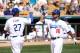 GLENDALE, AZ - MARCH 08: Andre Ethier #16 of the Los Angeles Dodgers high fives Matt Kemp #27 after Ethier hit a two run home against the Milwaukee Brewers during the third inning of the spring training game at Camelback Ranch on March 30, 2012 in Glendale, Arizona. (Photo by Christian Petersen/Getty Images)