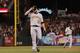 Chris Resop exits field after Giants walk-off win on Clint Barmes error.
