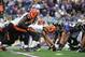 BALTIMORE - NOVEMBER 20: Mike McGlynn #66 of the Cincinnati Bengals snaps the ball against the Baltimore Ravens at M&T Bank Stadium on November 20, 2011 in Baltimore, Maryland. The Ravens defeated the Bengals 31-24. (Photo by Larry French/Getty Images)