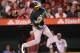 Oakland A's center fielder Yoenis Cespedes swings at a pitch during the A's 5-3 victory over the Los Angeles Angels on Tuesday night.