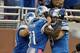 DETROIT, MI - OCTOBER 10: Calvin Johnson #81 and Matthew Stafford #9 of the Detroit Lions celebrate connecting for a touchdown against the Chicago Bears at Ford Field on October 10, 2011 in Detroit, Michigan. (Photo by Gregory Shamus/Getty Images)