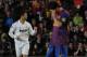 Ronaldo celebrates while Messi wipes away his tears.
