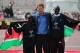 LONDON, ENGLAND - APRIL 22: Wilson Kipsang and Mary Keitany of Kenya pose with Prince Harry after winning the men and women's Elite race during the Virgin London Marathon 2012 on April 22, 2012 in London, England. (Photo by Matthew Lewis/Getty Images)