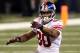 INDIANAPOLIS, IN - FEBRUARY 05: Victor Cruz #80 of the New York Giants reacts after a play against the New England Patriots during Super Bowl XLVI at Lucas Oil Stadium on February 5, 2012 in Indianapolis, Indiana. (Photo by Win McNamee/Getty Images)