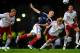GLASGOW, SCOTLAND - AUGUST 10: Kenny Miller of Scotland heads the ball under pressure from Christian Bjornshoj Poulsen of Denmark during the International Friendly Match between Scotland and Denmark at Hampden Park on August 10, 2011 in Glasgow, Scotland. (Photo by Laurence Griffiths/Getty Images)