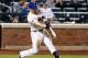NEW YORK, NY - APRIL 25: David Wright #5 of the New York Mets hits a two-run homerun in the sixth inning against the Miami Marlins at Citi Field on April 25, 2012 in the Flushing neighborhood of the Queens borough of New York City. Wright becomes the New York Mets All-Time franchise RBI leader with his two RBI's. (Photo by Mike Stobe/Getty Images)