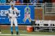 DETROIT, MI - NOVEMBER 20: Cam Newton #1 of the Carolina Panthers looks on from the sideline after throwing a fourth quarter interception while playing the Detroit Lions at Ford Field on November 20, 2011 in Detroit, Michigan. Detroit won the game 49-35. (Photo by Gregory Shamus/Getty Images)