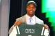 NEW YORK, NY - APRIL 26: Quinton Coples of North Carolina holds up a jersey as he stands on stage after he was selected #16 overall by the New York Jets in the first round of the 2012 NFL Draft at Radio City Music Hall on April 26, 2012 in New York City. (Photo by Al Bello/Getty Images)