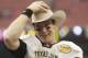 HOUSTON - DECEMBER 31: Quarterback Ryan Tannehill #17 of Texas A&M Texas A&M Aggies holds his MVP trophy after Texas A&M defeated Northwesten University 33-22 at Reliant Stadium on December 31, 2011 in Houston, Texas. (Photo by Bob Levey/Getty Images)