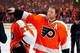 PHILADELPHIA, PA - APRIL 22: Claude Giroux #28 of the Philadelphia Flyers rubs the head of teammate Max Talbot #27, who was doing an interview, after the Flyers defeated the Pittsburgh Penguins 5-1 in Game Six of the Eastern Conference Quarterfinals to eliminate the Penguins during the 2012 NHL Stanley Cup Playoffs at Wells Fargo Center on April 22, 2012 in Philadelphia, Pennsylvania. (Photo by Paul Bereswill/Getty Images)