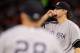 ARLINGTON, TX - APRIL 25: Phil Hughes #65 of the New York Yankees reacts as he leaves the game against the Texas Rangers at Rangers Ballpark in Arlington on April 25, 2012 in Arlington, Texas. (Photo by Ronald Martinez/Getty Images)