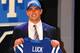 NEW YORK, NY - APRIL 26: Andrew Luck (R) from Stanford holds up a jersey stage after Luck was selected #1 overall by the Indianapolis Colts in the first round of the 2012 NFL Draft at Radio City Music Hall on April 26, 2012 in New York City. (Photo by Al Bello/Getty Images)