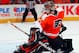 PHILADELPHIA, PA - APRIL 22: Goalie Ilya Bryzgalov #30 of the Philadelphia Flyers makes a save against the Pittsburgh Penguins in Game Six of the Eastern Conference Quarterfinals during the 2012 NHL Stanley Cup Playoffs at Wells Fargo Center on April 22, 2012 in Philadelphia, Pennsylvania. The Flyers won the game 5-1 to eliminate the Penguins from the playoffs (Photo by Paul Bereswill/Getty Images)
