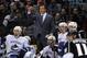 Alain Vigneault makes a call on the Canucks bench.