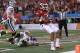 ARLINGTON, TX - JANUARY 06: Jarius Wright #4 of the Arkansas Razorbacks makes a touchdown pass reception against Arthur Brown #4 of the Kansas State Wildcats during the Cotton Bowl at Cowboys Stadium on January 6, 2012 in Arlington, Texas. (Photo by Ronald Martinez/Getty Images)