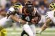NEW ORLEANS, LA - JANUARY 03: David Wilson #4 of the Virginia Tech Hokies runs the ball against the Michigan Wolverines during the Allstate Sugar Bowl at Mercedes-Benz Superdome on January 3, 2012 in New Orleans, Louisiana. (Photo by Matthew Stockman/Getty Images)