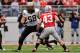 COLUMBUS, OH - OCTOBER 23: Dennis Kelly #68 of the Purdue Boilermakers blocks against the Ohio State Buckeyes at Ohio Stadium on October 23, 2010 in Columbus, Ohio. (Photo by Jamie Sabau/Getty Images)