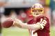 MIAMI, FL - NOVEMBER 13: John Beck #12 of the Washington Redskins warms up prior to the game against the Miami Dolphins on November 13, 2011 at Sun Life Stadium in Miami, Florida. (Photo by Joel Auerbach/Getty Images)