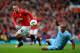 MANCHESTER, ENGLAND - OCTOBER 23: Wayne Rooney of Manchester United competes with Vincent Kompany of Manchester City during the Barclays Premier League match between Manchester United and Manchester City at Old Trafford on October 23, 2011 in Manchester, England. (Photo by Laurence Griffiths/Getty Images)