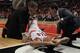 CHICAGO, IL - APRIL 28: Derrick Rose #1 of the Chicago Bulls is examined after suffering an injury against the Philadelphia 76ers in Game One of the Eastern Conference Quarterfinals during the 2012 NBA Playoffs at the United Center on April 28, 2012 in Chicago, Illinois. The Bulls defeated the 76ers 103-91. NOTE TO USER: User expressly acknowledges and agrees that, by downloading and or using this photograph, User is consenting to the terms and conditions of the Getty Images License Agreement. (Photo by Jonathan Daniel/Getty Images)