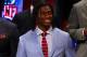 NEW YORK, NY - APRIL 26: Robert Griffin III from Baylor smiles on stage during the first round of the 2012 NFL Draft at Radio City Music Hall on April 26, 2012 in New York City. Griffin III was selected #2 overall by the Washington Redskins. (Photo by Al Bello/Getty Images)