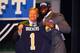 NEW YORK, NY - APRIL 26: Michael Brockers (R) of LSU holds up a jersey as he stands on stage with NFL Commissioner Roger Goodell after he was selected #14 overall by the St. Louis Rams in the first round of the 2012 NFL Draft at Radio City Music Hall on April 26, 2012 in New York City. (Photo by Al Bello/Getty Images)