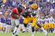 BATON ROUGE, LA - NOVEMBER 20: Stefoin Francois #23 and Karnell Hatcher #37 of the Louisiana State University Tigers tackle Brandon Bolden #34 of the Ole Miss Rebels at Tiger Stadium on November 20, 2010 in Baton Rouge, Louisiana. (Photo by Kevin C. Cox/Getty Images)