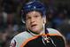 UNIONDALE, NY - APRIL 05: Kyle Okposo #21 of the New York Islanders skates against the Winnipeg Jets at the Nassau Veterans Memorial Coliseum on April 5, 2012 in Uniondale, New York. The Islanders defeated the Jets 5-4. (Photo by Bruce Bennett/Getty Images)