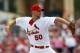 JUPITER, FL - MARCH 18: Adam Wainwright #50 of the St. Louis Cardinals pitches during a game against the Miami Marlins at Roger Dean Stadium on March 18, 2012 in Jupiter, Florida. (Photo by Sarah Glenn/Getty Images)