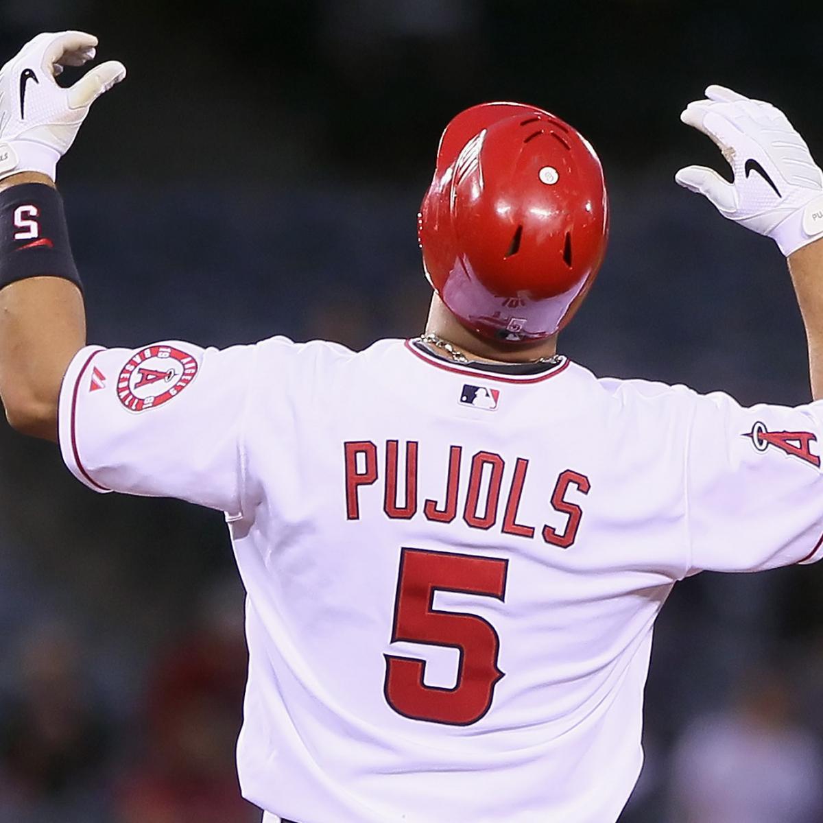 Pujols returns to his roots for hitting clinic