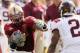 CHESTNUT HILL, MA - SEPTEMBER 25: Montel Harris #2 of the Boston College Eagles carries the ball and tries to manuever around Davon Morgan #2 of the Virginia Tech Hokies on September 25, 2010 at Alumni Stadium in Chestnut Hill, Massachusetts. (Photo by Elsa/Getty Images)