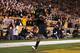TEMPE, AZ - NOVEMBER 19: Wide receiver Gerell Robinson #8 of the Arizona State Sun Devils scores on a 11 yard touchdown reception against the Arizona Wildcats during the second quarter of the college football game at Sun Devil Stadium on November 19, 2011 in Tempe, Arizona. (Photo by Christian Petersen/Getty Images)