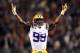 OXFORD, MS - NOVEMBER 19: Sam Montgomery #99 of the LSU Tigers celebrates after a play against the Ole Miss Rebels on November 19, 2011 at Vaught-Hemingway Stadium in Oxford, Mississippi. LSU beat Mississippi 52-3. (Photo by Joe Murphy/Getty Images)