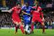 LONDON, UNITED KINGDOM - NOVEMBER 29: Romelu Lukaku of Chelsea is closed down by Jose Enrique (L) and Sebastian Coates of Liverpool during the Carling Cup quarter final match between Chelsea and Liverpool at Stamford Bridge on November 29, 2011 in London, England. (Photo by Jamie McDonald/Getty Images)