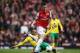 LONDON, ENGLAND - MAY 05: Laurent Koscielny of Arsenal is tackled by Simeon Jackson of Norwich City during the Barclays Premier League match between Arsenal and Norwich City at the Emirates Stadium on May 5, 2012 in London, England. (Photo by Bryn Lennon/Getty Images)