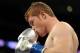LOS ANGELES, CA - SEPTEMBER 18: Saul Alvarez of Mexico Carlos kisses his gloves before his match against Baldomir of Argentina in the WBC Super Welterweight Silver Title fight at Staples Center on September 18, 2010 in Los Angeles, California. (Photo by Harry How/Getty Images)