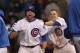 CHICAGO, IL - MAY 06: David DeJesus #9 (L) and Tony Campana #1 of the Chicago Cubs celebrate a win over the Los Angeles Dodgers at Wrigley Field on May 6, 2012 in Chicago, Illinois. The Cubs defeated the Dodgers 4-3 in 11 innings. (Photo by Jonathan Daniel/Getty Images)