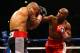 LAS VEGAS, NV - MAY 05: (R-L) Floyd Mayweather Jr. throws a right to the head of Miguel Cotto during their WBA super welterweight title fight at the MGM Grand Garden Arena on May 5, 2012 in Las Vegas, Nevada. (Photo by Al Bello/Getty Images)