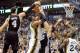 SALT LAKE CITY, UT - MAY 5: Daniel Green #4 of the San Antonio Spurs blocks the shot of Derrick Favors #15 of the Utah Jazz during the fourth quarter of Game Three of the Western Conference Quarterfinals in the 2012 NBA Playoffs at EnergySolutions Arena on May 05, 2012 in Salt Lake City, Utah. The Spurs won the game 102-90. NOTE TO USER: User expressly acknowledges and agrees that, by downloading and or using this photograph, User is consenting to the terms and conditions of the Getty Images License Agreement. (Photo by Steve Dykes/Getty Images)