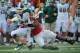 LINCOLN, NE - OCTOBER 29: Fullback Todd Anderson #42 of the Michigan State Spartans tries to slip the grip of linebacker Lavonte David #4 of the Nebraska Cornhuskers during their game at Memorial Stadium October 29, 2011 in Lincoln, Nebraska. Nebraska defeated Michigan State 24-3. (Photo by Eric Francis/Getty Images)