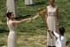 ATHENS, GREECE - MAY 10: High Priestess Ino Menegaki lights the London 2012 Olympic Torch during the Lighting Ceremony of the Olympic Flame at Ancient Olympia on May 10, 2012 in Olympia, Greece. (Photo by Milos Bicanski/Getty Images)
